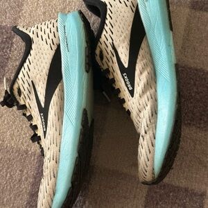 Brooks Running Shoes with Light Blue Sole and Black Pattern
